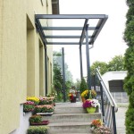 Eingangsüberdachung mit Geländer als Stahl-Glaskonstruktion für Blumenladen
